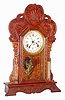 Waterbury Clock Co., Waterbury, Conn., "Dabney" oak 8 day, time, strike and calendar mantel clock, c1906