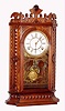 Waterbury Clock Co., Waterbury, Conn., "Granville" walnut 8 day, time and strike mantel clock, c1886