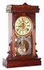 Waterbury Clock Co., Waterbury, Conn., "Elmwood" walnut 8 day, time and strike mantel clock with alarm, c1885