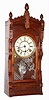 Waterbury/Kroeber walnut 8 day, time and strike parlor clock, c1883