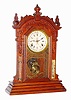 Waterbury Clock Co., Waterbury, Conn., walnut 8 day, time and strike calendar mantel clock, c1895