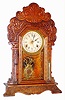 Waterbury Clock Co., Waterbury, Conn., "Dabney" oak 8 day, time and strike calendar mantel clock, c1912