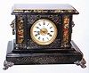 Waterbury Clock Co., Waterbury, Conn., black enameled 8 day, time and strike mantel clock, c1893