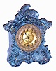 Waterbury Clock Co., Waterbury, Conn., enameled metal 30 hour time and strike miniature mantel clock, c1895