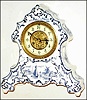 Waterbury Clock Co., Waterbury, Conn., Delft style, 8 day, time and strike porcelain mantel clock, c1900