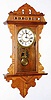 Waterbury Clock Co., Waterbury, Conn., "Hamilton" hanging ash 8 day, time and strike gingerbread clock, c1891