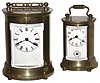 Clocks- 2 (Two) Waterbury Clock Co. round gold plated brass and glass carriage clocks, "Satellite" and "Skip", c1909