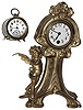 Clocks- 2 (Two) Waterbury Clock Co., Waterbury, Conn., 8 day novelty time pieces: "Fang" brass drum, gold-plated figural, c1900