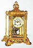 Waterbury Clock Co., Waterbury, Conn., "Rennes" gold plated 8 day, time and strike crystal regulator, c1906