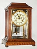 Waterbury Clock Co., Waterbury, Conn., "Cher" inlaid mahogany 8 day, time and strike crystal regulator, c1913