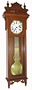 Waterbury Clock Co., Waterbury, Conn., "REGULATOR No. 60", oak cased ,jeweler's time piece, with wide rod gridiron pendulum, porcelain dial and center seconds hand, c1903