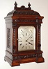 English, by a premier maker (probably Smith and Sons), for DENT, clockmaker to the Queen, 33 Cockspur St, London, 3-fusee bracket clock, chiming the quarters on choice Whittington-8-bells, or Westminster on 4 gongs, and counting the hours on a large flat wire cathedral gong, with an engraved and silvered dial, c1890