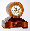 Waterbury Clock Co., Waterbury, Conn., mahogany 8 day, time and strike tambour mantel clock, c1910