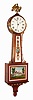 Foster Campos, Pembroke, Mass., 8 day Banjo or Patent time piece in a banded and inlaid mahogany case with reverse painted tablets, signed on the movement, case and weight, stamped no. 50 and made in 1979.