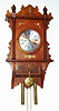 Waterbury Clock Co., Waterbury, Conn., "Study", unknown model , 8 day, time and strike, oak case wall clock, c1905.