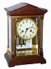 Waterbury Clock Co., Waterbury, Conn., "Marnay" mahogany and gold plated 8 day, time and strike crystal regulator, c1914