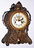 Waterbury Clock Co., Waterbury, Conn., cast metal 8 day, time and strike mantel clock, c1906