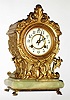 Waterbury Clock Co., Waterbury, Conn., cast metal and onyx 8 day, time and strike mantel clock, c1900