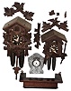 Clocks- 3 (Three) German 30 hour modern clocks: two small cuckoos; Belfor pressed glass alarm clock. Wood clock shelf also included.