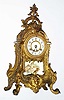 Waterbury Clock Co., Waterbury, Conn., "Nantes" gold plated cast metal 8 day, time and strike mantel clock, c1915