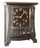 New Haven Clock Co., New Haven, Conn., "Los Santos" dark oak 8 day, time and strike mission mantel clock, c1913