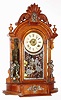 Ansonia Clock Co., New York, NY, "Triumph" oak mirror side time and strike parlor clock with alarm, c1880