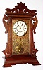 Seth Thomas Clock Co., Thomaston, Conn., "Newark" walnut time and strike 8 day city clock, 1889