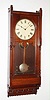 Seth Thomas Clock Co., Thomaston, Conn. "Queen Anne" walnut 8 day, time and strike spring wound wall clock, c1880