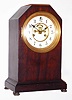 Waterbury Clock Co., Waterbury, Conn., "Cornwall" mahogany 8 day, time and strike cabinet clock, c1910