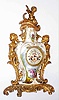 French Sevres porcelain and bronze 8 day, time and strike figural mantel clock,