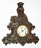 American Clock Co., New York, "Reaper" 8 day, time and strike cast metal figural mantel clock, c1880