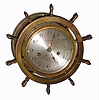 Waterbury Clock Co., Waterbury, Conn., "Ship's Bell No. 10" brass 8 day striking marine clock with hinged yacht wheel bezel, c1915