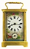 French carriage clock, polished brass Corniche case with porcelain panels, very colorful overglaze enamel decoration featuring landscapes with birds, rectangular beveled glass in top for viewing escapement, spring powered eight day time and alarm movement with cylinder platform, alarm bell in base, Roman numeral time dial, Arabic alarm, with beveled glass front, c1910