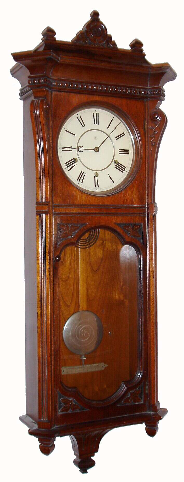 Seth Thomas Clock Co., Thomaston, Conn., "Marcy" wall clock, 8 day, time and quarter strike on two cup bells and hours on a cathedral gong, spring driven movement in a walnut case with painted metal dial, dated 1886 — Antique Clocks Price Guide