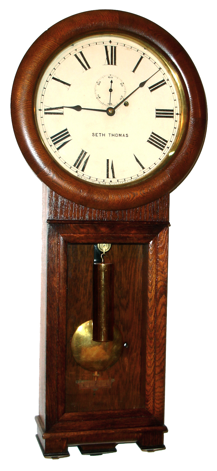 Seth Thomas Clock Co., Thomaston, Conn., "Regulator No. 2" wall clock, 8 day, time only, weight driven movement in an oak case with painted metal dial, dated 1906 — Antique Clocks Price Guide