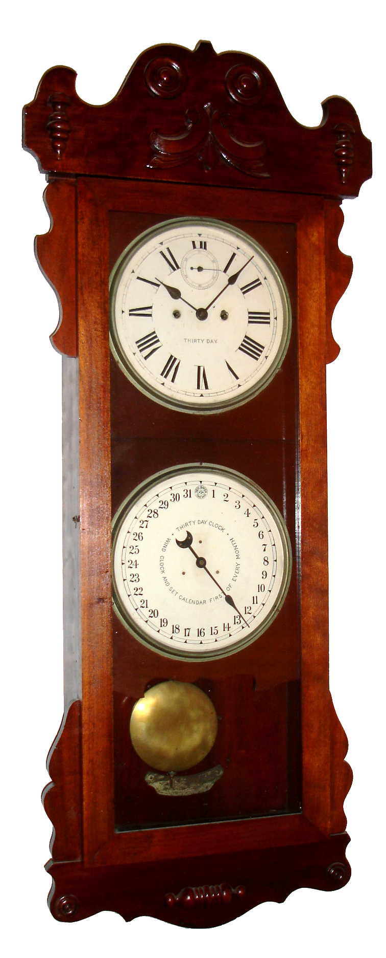 New Haven Clock Co., New Haven, Conn., "Rutland" wall clock, 30 day, time and calendar, spring driven movement in a mahogany case with painted metal dials, c1914 — Antique Clocks Price Guide