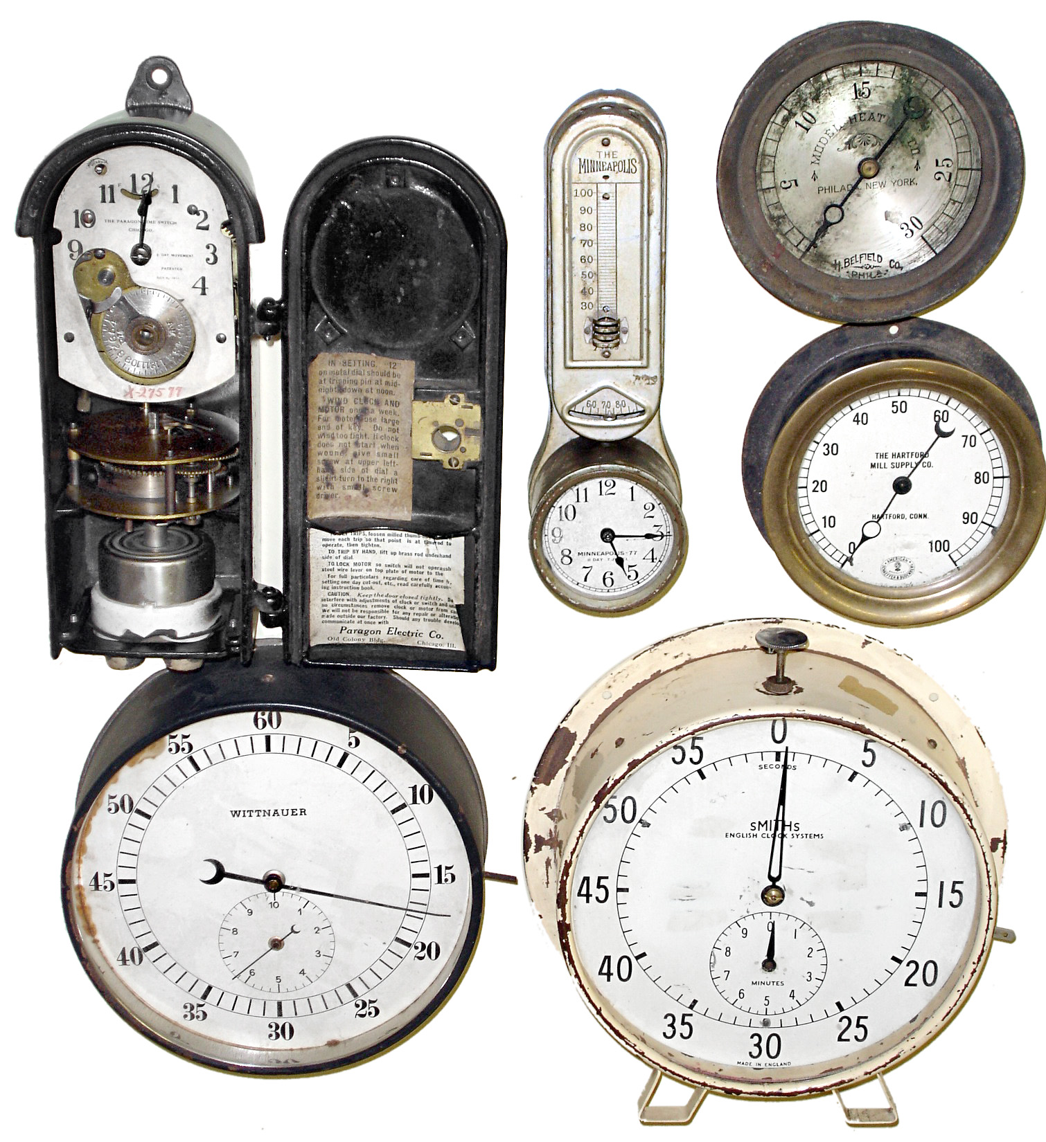 Timers and gauges- 6 (Six) in metal cases: Smith's and Wittnauer large seconds timers; Minneapolis 77 thermostat timer; Paragon time switch; and pressure gauges by Hartford Mill Supply and Belfield; 20th century — Antique Clocks Price Guide
