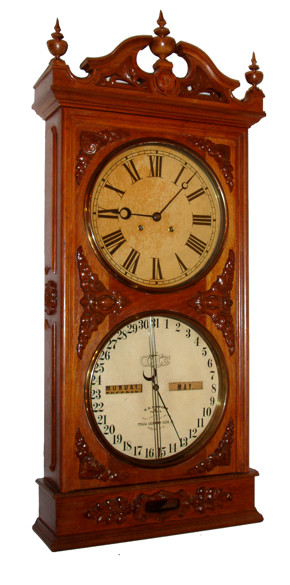 Ithaca Calendar Clock Co., Ithaca, NY, "Regulator No. 1 or Hanging Bank", 8 day, time and perpetual calendar, two weight driven movement in a walnut case with applied crushed shell moldings and papered metal dials, dated 1870 — Antique Clocks Price Guide