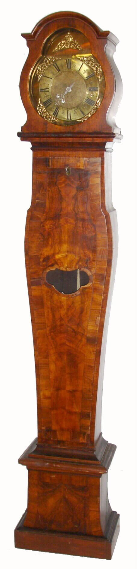 Dial signed:  Joseph Fordham, Braintree, England tall clock, 30 hour, time and bell strike, one weight driven movement with endless rope winding, now in a Bombay style highly figured crotch walnut veneer case with heavy walnut banding around trunk exterior and base.  The one handed brass dial signed "Jos. Fordham Braintree" has applied brass corner spandrels and English crown and cherub spandrel in arch, c1730 — Antique Clocks Price Guide