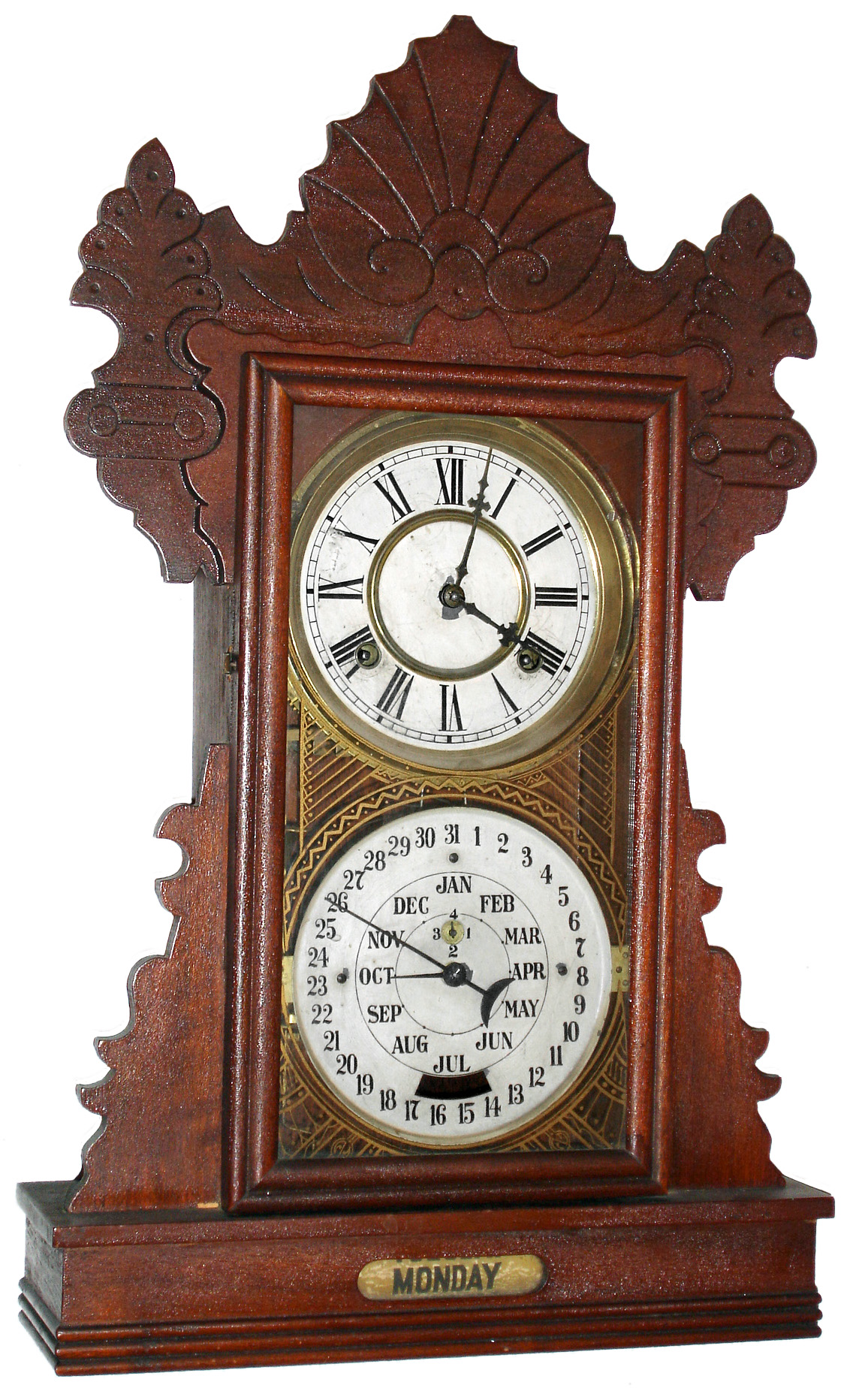 Charles W. Feishtinger, Fritztown, Pa, 8 day, time and strike calendar mantel clock.   These clocks were manufactured by the Waterbury Clock Co. for Feishtinger.  This is Waterbury's "Hendon" case with modification to the base for the calendar, c1895. — Antique Clocks Price Guide