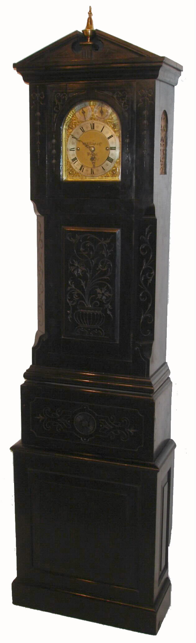 English, triple fusee movement, quarter chiming on choice of 8-bells or 5 tubular bells, now in a well constructed case of the same period, with hand carved decorations, purpose made to fit in a room corner of a home near Bath, all parts, c1910, the dial signed W. W. Kemp and Co., Bristol. — Antique Clocks Price Guide