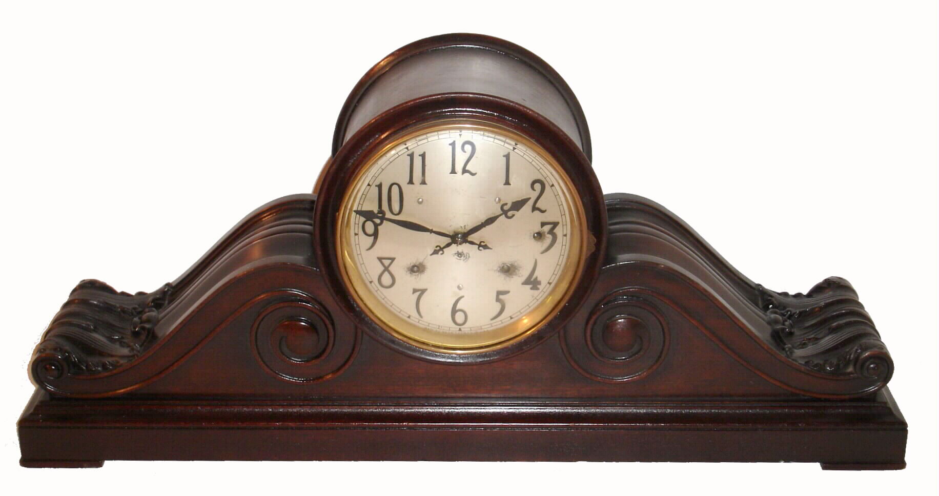 Seth Thomas Clock Co., Thomaston, Conn., "Chime Clock No. 58", 5-bell Sonora chime mantel clock, large tambour case [32.5" wide] with carved sides, and with 8" silvered dial with raised bronze numerals, c1915 — Antique Clocks Price Guide