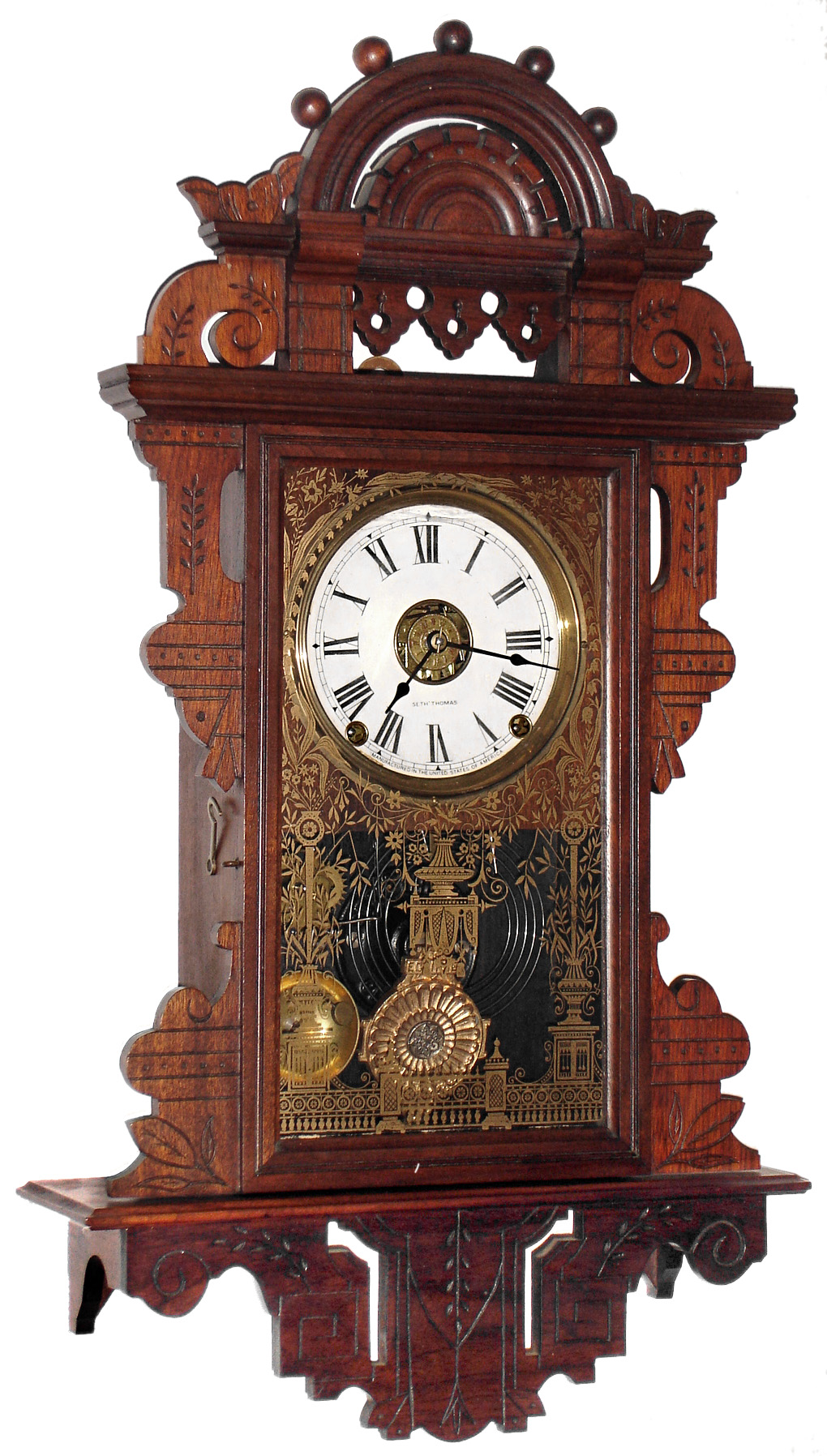 Seth Thomas Clock Co., Thomaston, Conn., "Eclipse" 8 day time, strike and alarm walnut wall clock, No. M.3594,c1900 — Antique Clocks Price Guide
