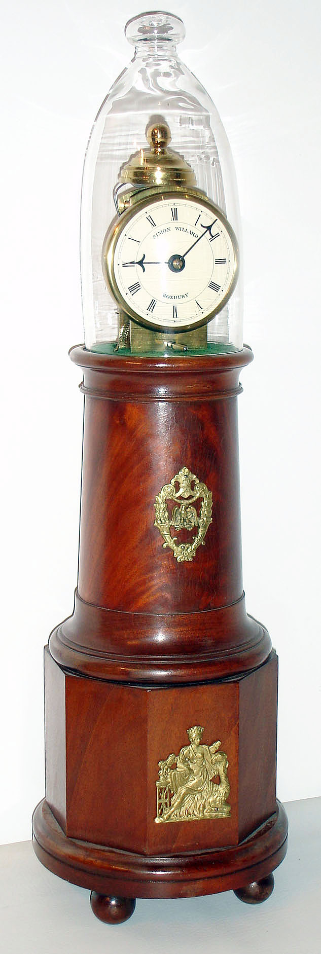 Hugh Witham, Owosso, Michigan, "Willard Lighthouse" reproduction clock, 8 day, time only, weight driven movement by John Gass, Holt, Mich. (stamped on movement) in mahogany veneer case with porcelain dial made in London, England signed "SIMON WILLARD ROXBURY" with blown gloss dome manufactured by the London School of Glass Blowing, c1979 s#3 — Antique Clocks Price Guide