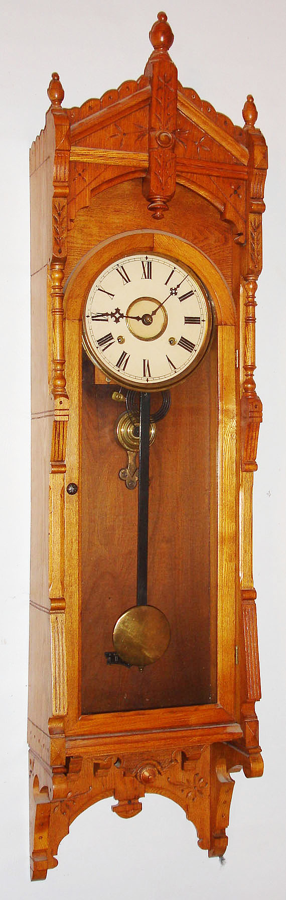 F. Kroeber Clock Co., New York, NY "Regulator No. 47" wall clock, 8 day, time and strike, spring driven movement in an ash case with paper dial, c1884 — Antique Clocks Price Guide