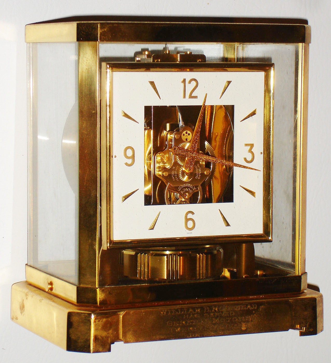 LeCoultre and Co., Swiss, "Atmos" perpetual wind gold plated brass and glass mantel clock, 1961 presentation — Antique Clocks Price Guide