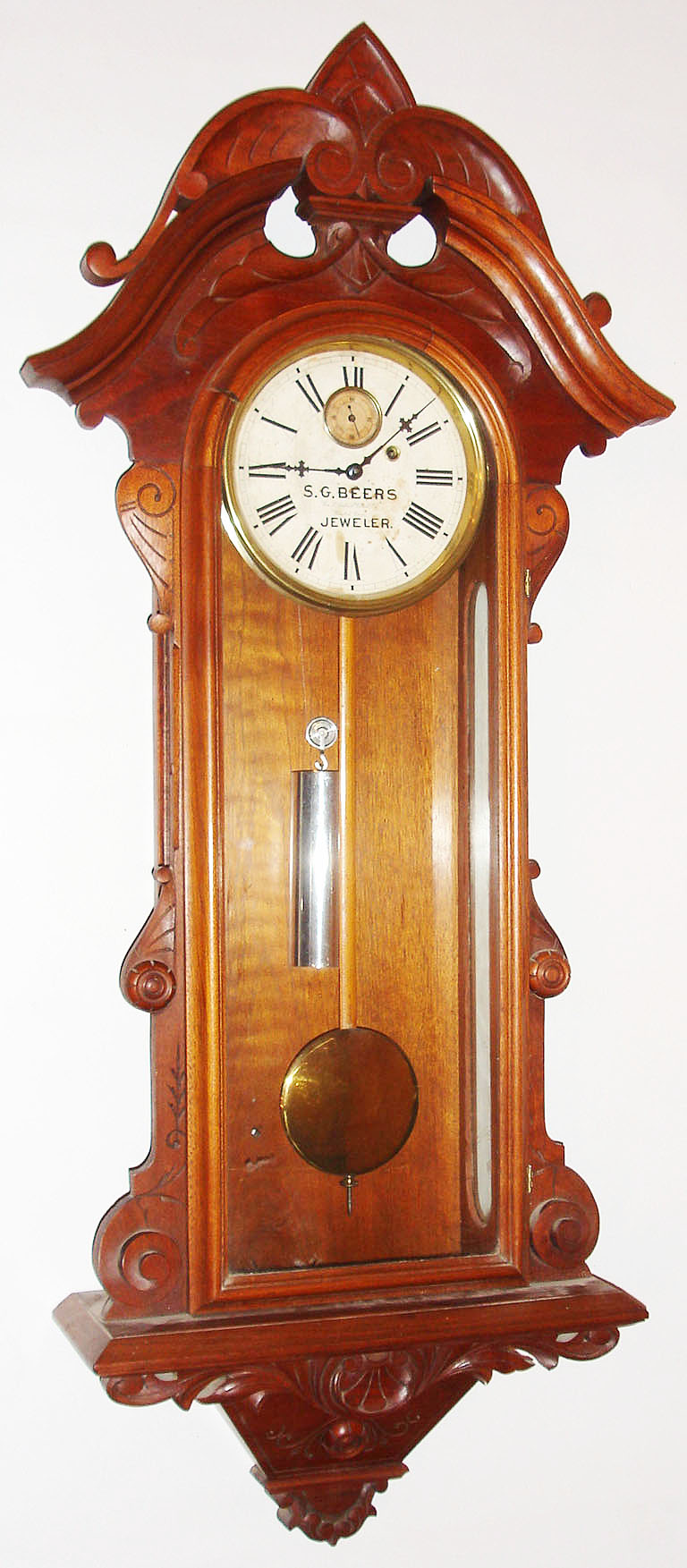 Wm. L. Gilbert Clock Co., Winsted, Conn., "Regulator No. 5" wall clock, 8 day, time only, weight driven movement in a walnut case with private label paper dial for "S.G. BEERS JEWELER", c1885 — Antique Clocks Price Guide