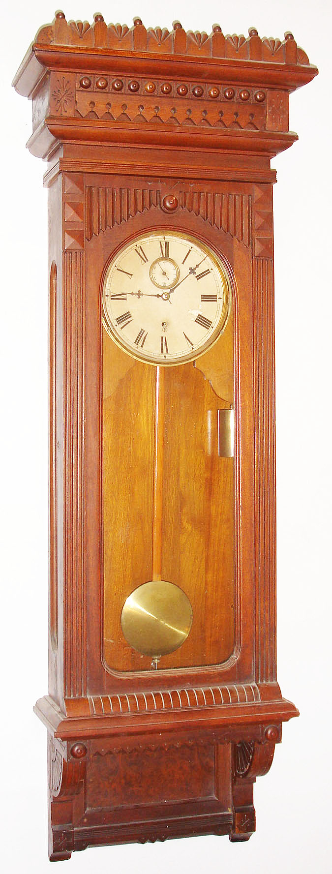 Wm. L. Gilbert Clock Co., Winsted, Conn., "Regulator No. 11" wall clock, 8 day, time only, two brass weight driven movement in a walnut case with paper dial, c1900 — Antique Clocks Price Guide