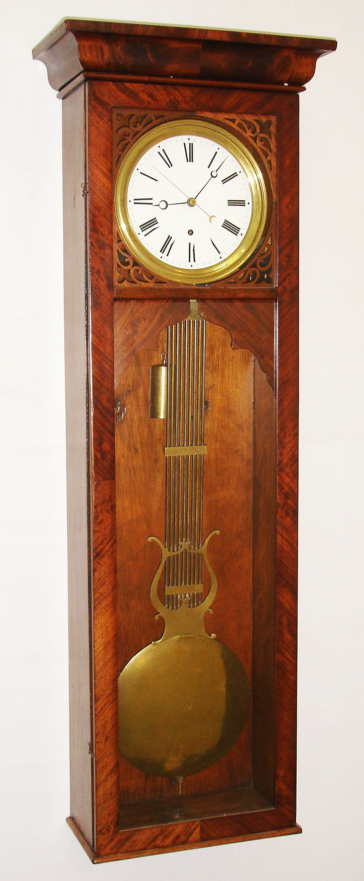 Jeweler's regulator, 8 day, time only, weight driven movement with pinwheel escapement and heavy gridiron pendulum in a mahogany veneer case with ornate fretwork around white enamel dial, c1880 — Antique Clocks Price Guide