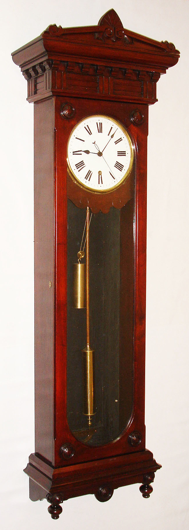 New Haven Clock Co., New Haven, Conn., "Regulator No. 10" wall clock, 8 day, time only, weight driven movement with deadbeat escapement and maintaining power in a mahogany case with white enamel dial, c1900 — Antique Clocks Price Guide